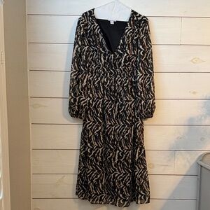 Elegant Black and Cream Patterned Dress